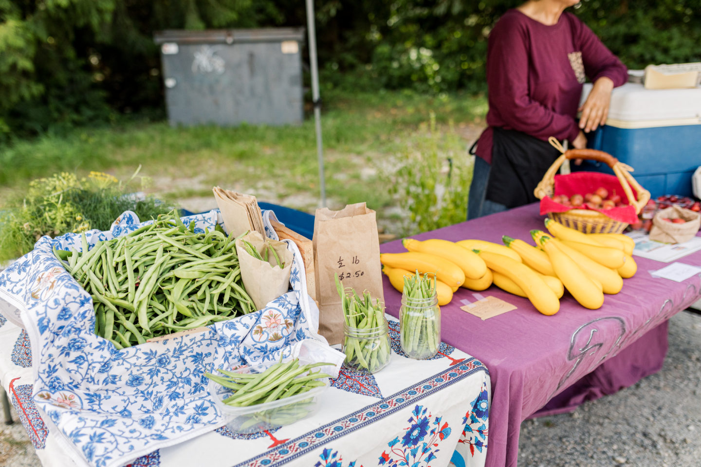 Market table with beans and zucchini